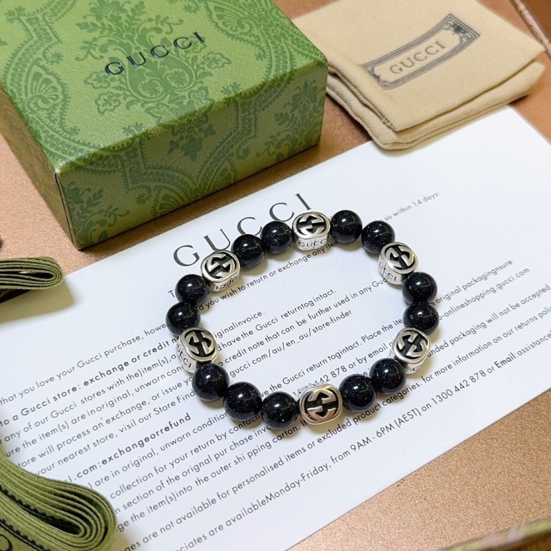 G*u*i bracelets